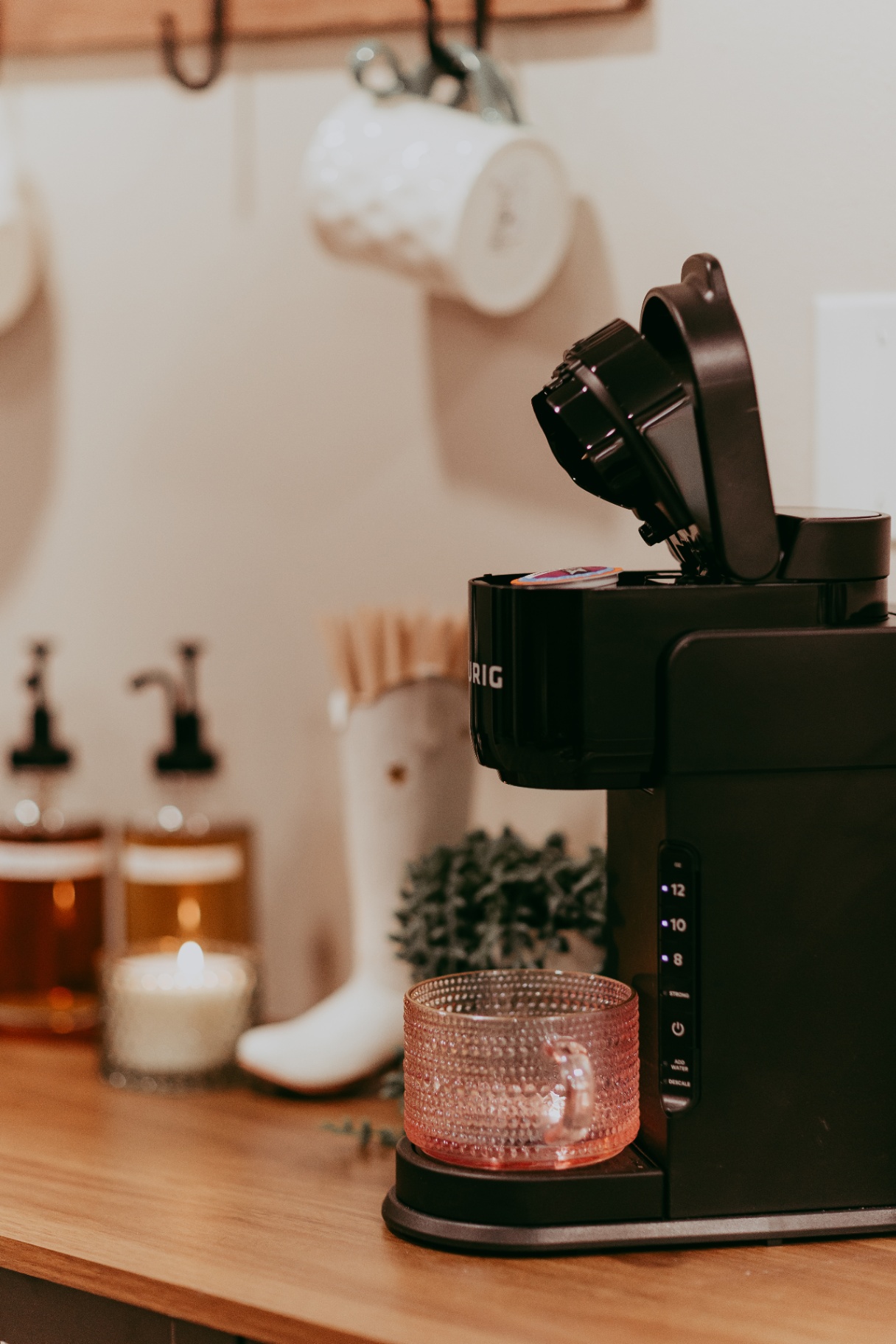 Coffee station and warm candlelight in the salon